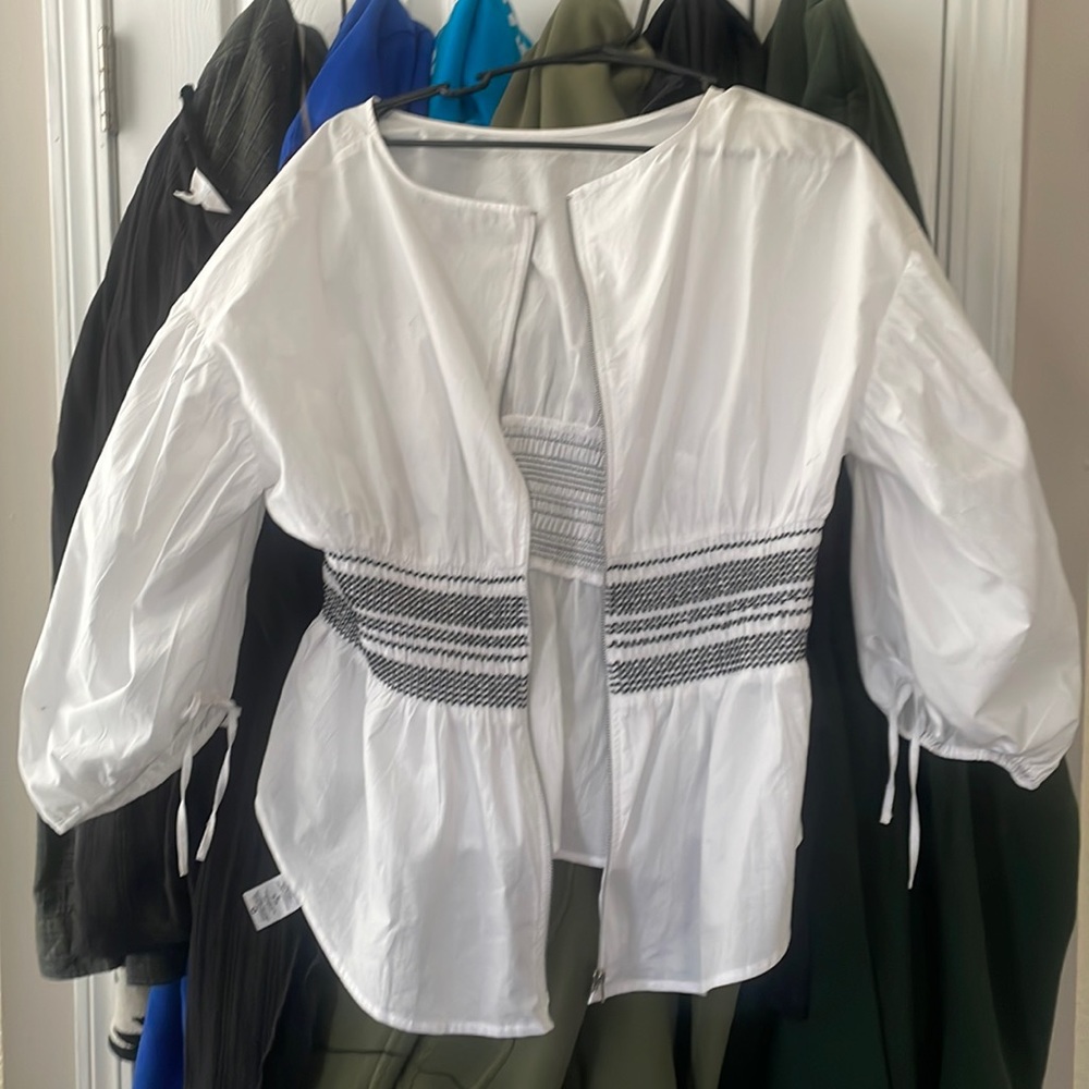 White summer blouse with cinched waist. Very flattering!